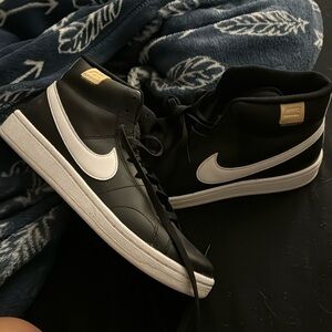 Men’s high top Nike shoes. Brand new. Never worn
